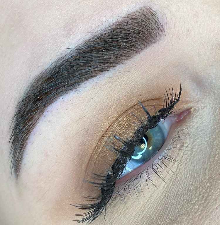 beautiful eye and eyebrow showing perfect microblading and shading technique